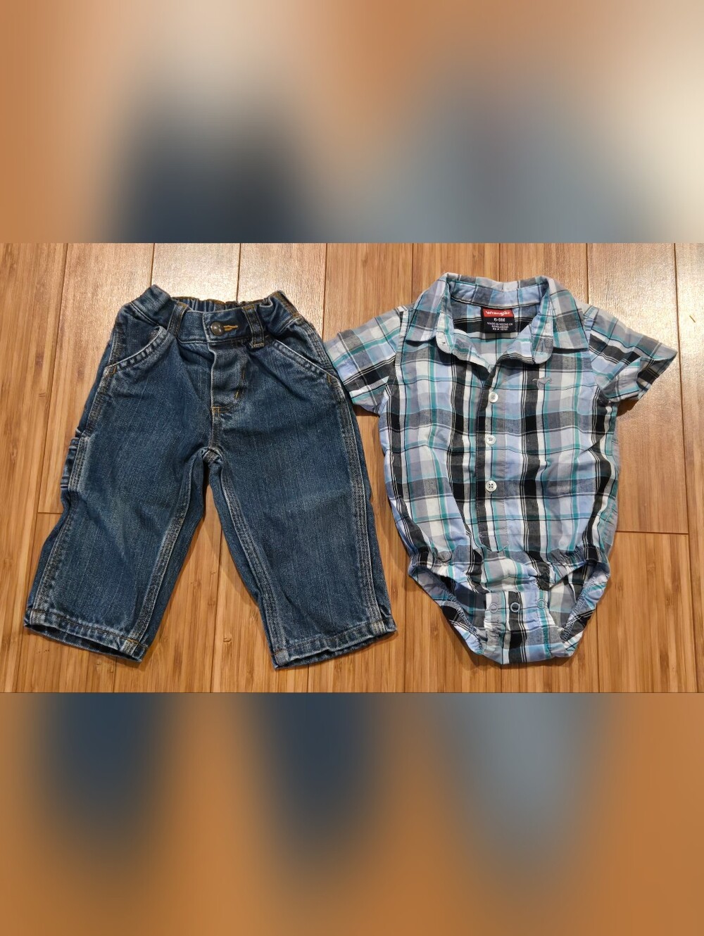Carhartt Jeans And A Wrangler Short-Sleeve Plaid Button-Up Top
